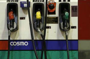 Petrol nozzles are seen at Cosmo Energy Holdings' Cosmo Oil service station in Tokyo, Japan, December 16, 2015. REUTERS/Yuya Shino/File Photo
