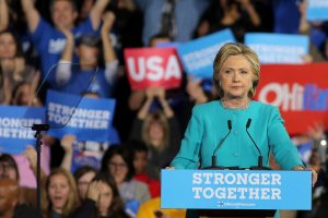 U.S. Democratic presidential nominee Hillary Clinton pauses as she speaks during a campaign rally in Cleveland, Ohio, U.S., November 6, 2016. REUTERS/Carlos Barria